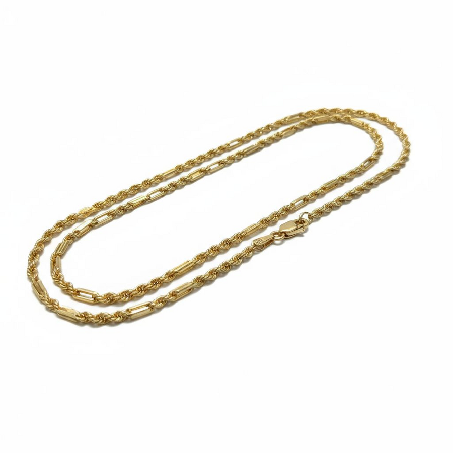 Gold chain necklace on a white background