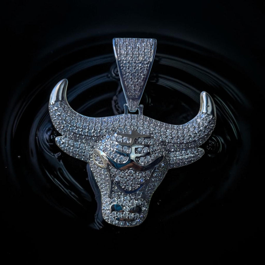 Iced out white gold filled bull pendant with 5 grade cz hand cut.