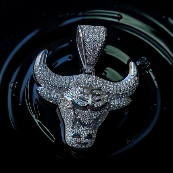 Iced out white gold filled bull pendant with 5 grade cz hand cut.